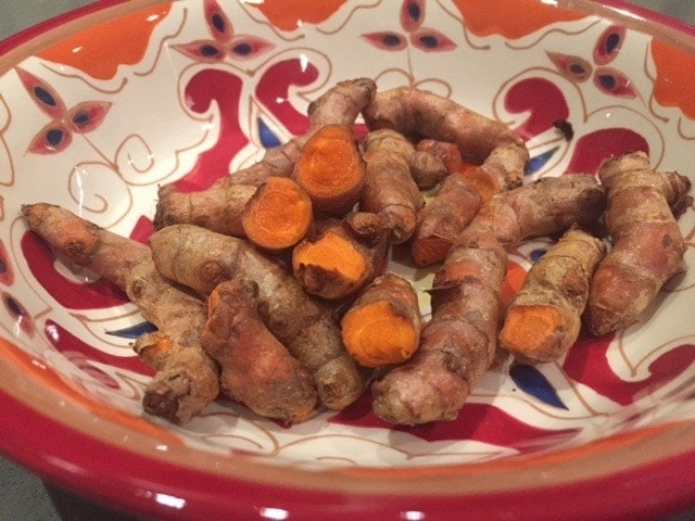 bowl with turmeric roots