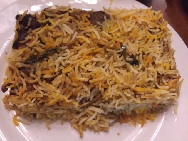 biryani in a rectangular shape on a plate