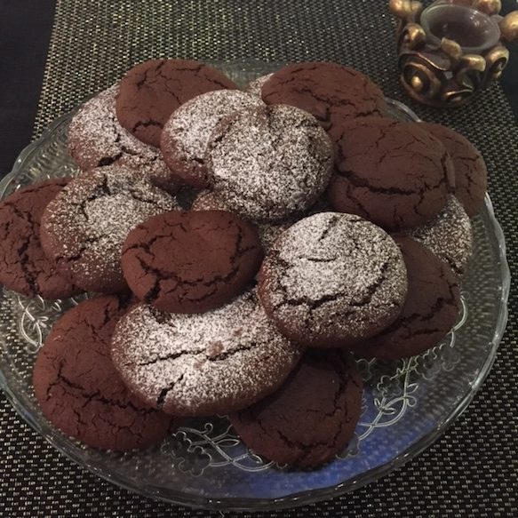 a pile of nutella cookies on a glass plate