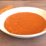 Bean soup in white soup bowl with bread