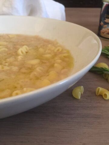 soup on table near pasta shells