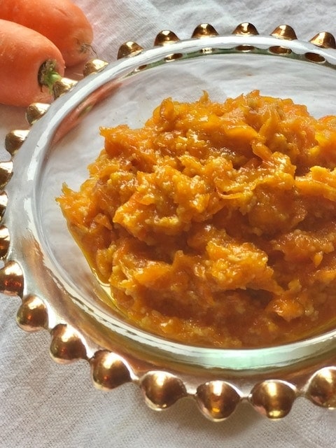 closeup of halwa in a glass bowl