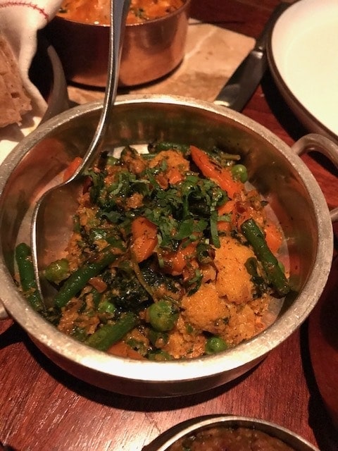 Methi mixed vegetable curry in a copper serving bowl