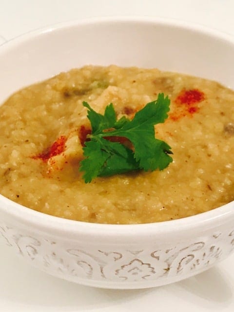 closeup of dal in a small white bowl