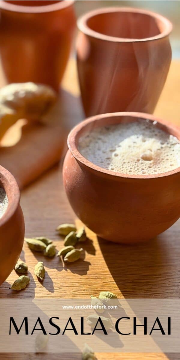 Pin image of earthenware cup of masala chai.