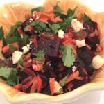 beet salad in a yellow bowl