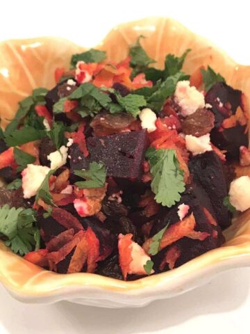 beet salad in a yellow bowl