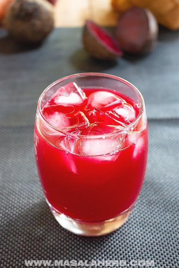 glass of juice with ice cubes