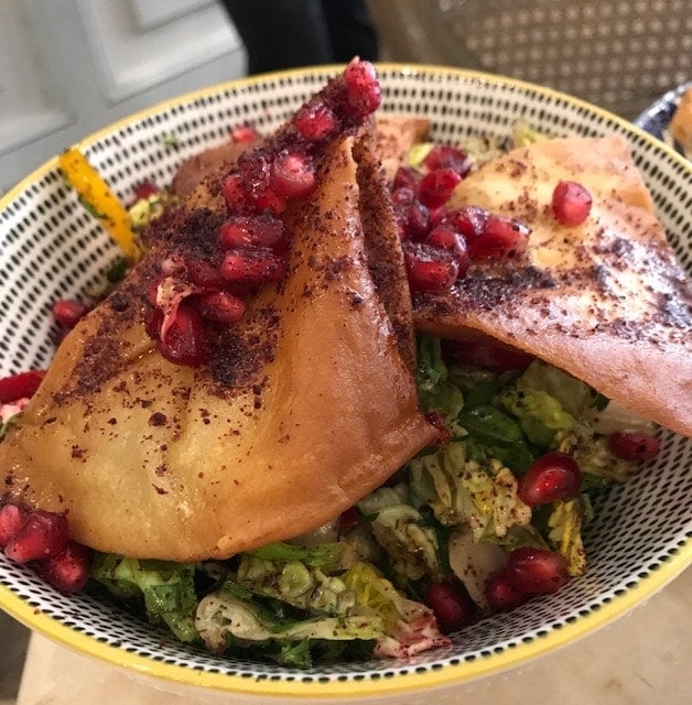 Salad with fried pitta and pomegranate seeds