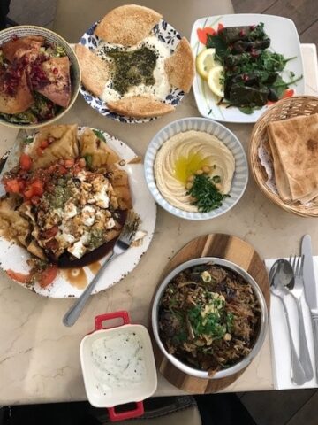 Table spread with Middle eastern dishes