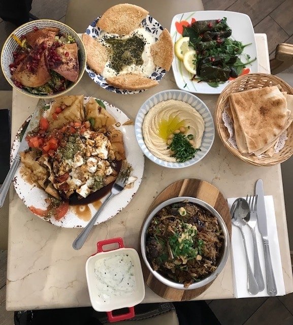 Table spread with Middle eastern dishes