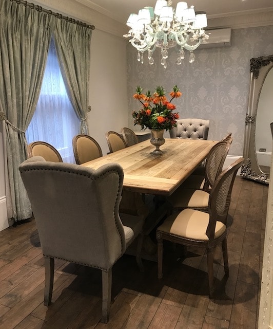Private dining room with 10 chairs around a long table