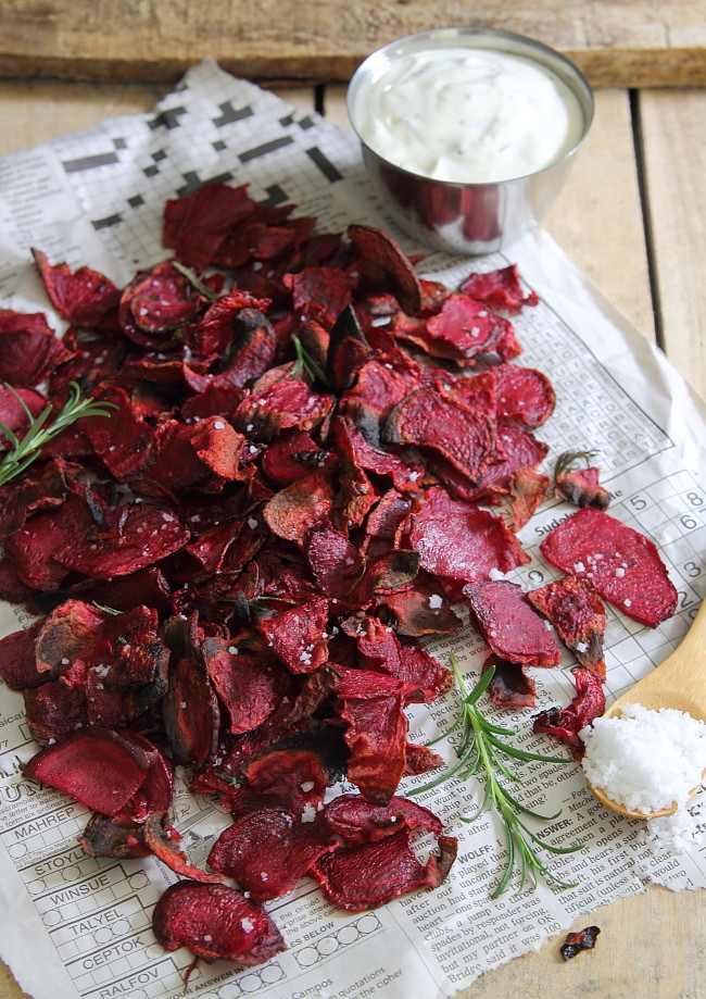 beet chips spread out on paper on table