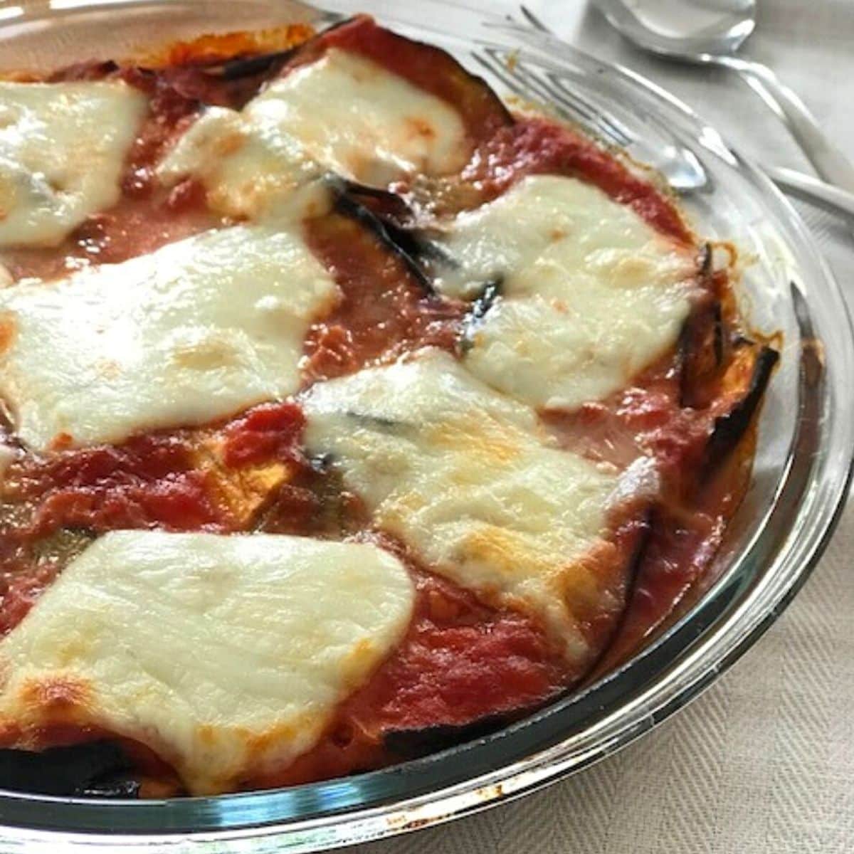 Eggplant parmesan in round glass dish