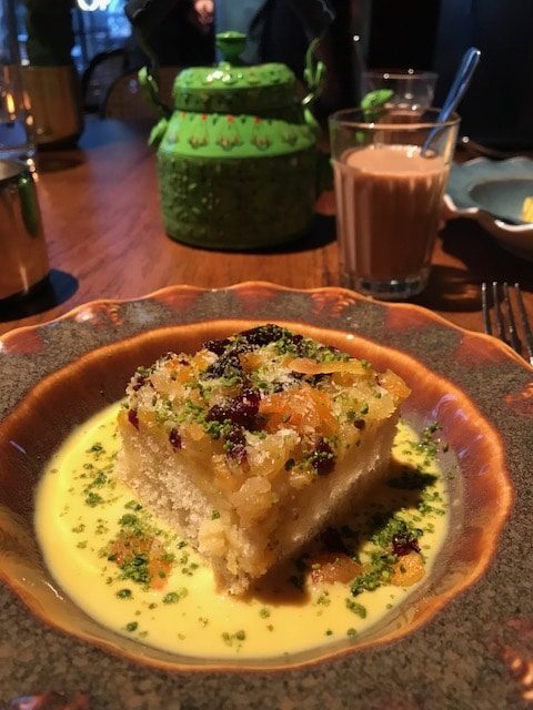 Serving of Double ka meetha with masala tea 