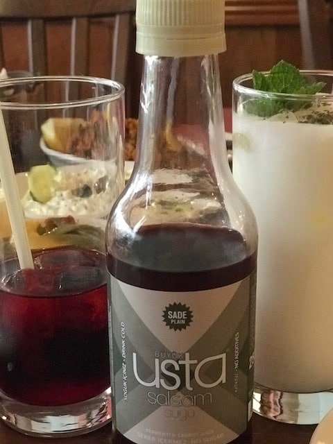 Turkish Turnip juice in bottle and glass and a glass of Ayran