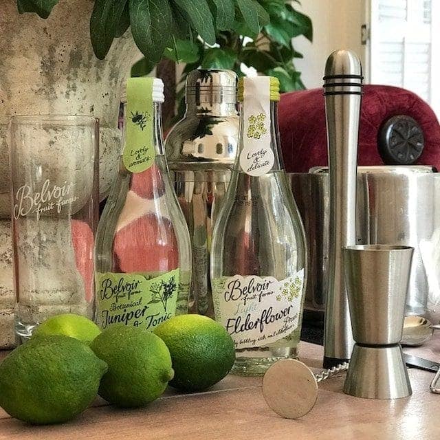 small bottles of Light elderflower presse and jiniper & tonic, with limes