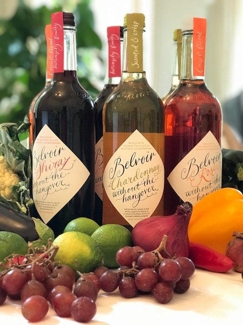 3 varieties of Wines without the hangover surrounded by fresh fruit