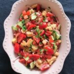 view of the salad in lilac serving bowl