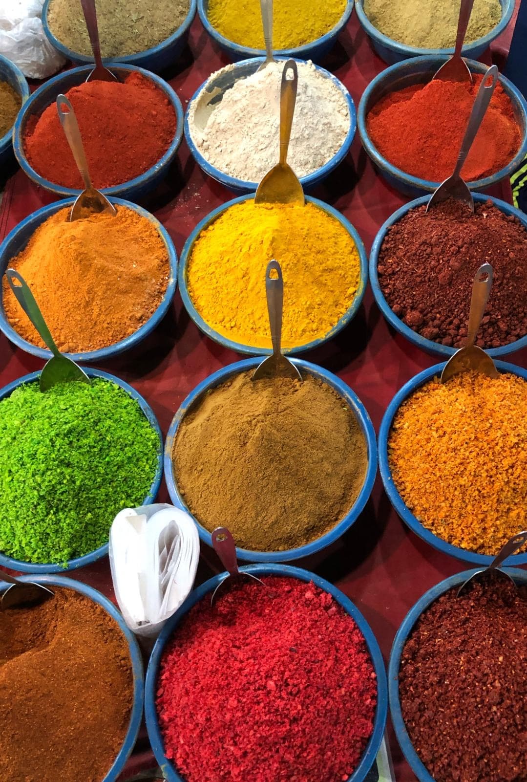 Many bowls of Indian brightly coloured spices