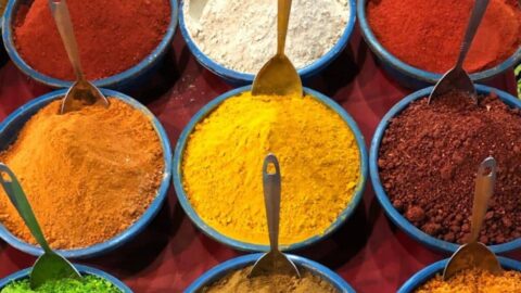 Bowls of colourful Indian spices at a market