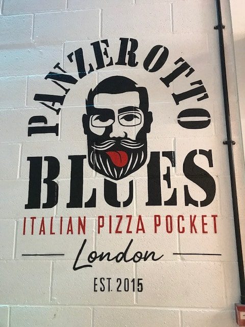 Panzerotto Blues logo on a wall