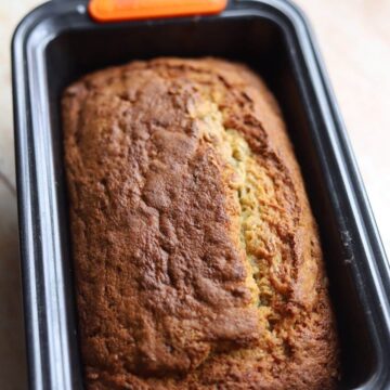 Image of banana bread in a loaf pan.