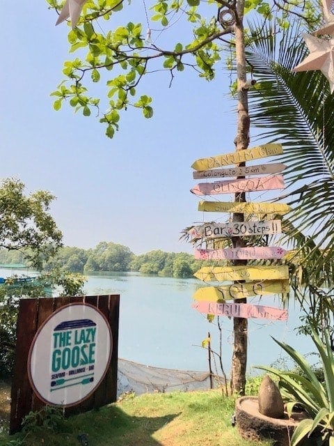 signs for the restaurant by the river