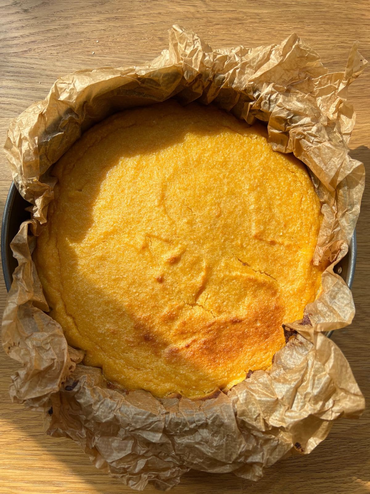 Baked orange cake in pan.