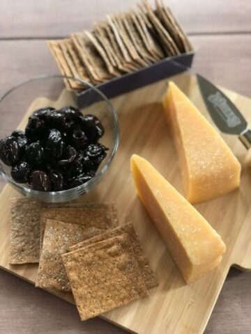 cheese board with wedges of Dziugas