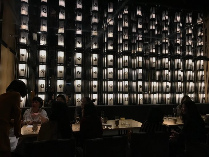 A wall of black and white lanterns inside Ginza Onodera.