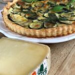 wedge of Comté and zucchini tart