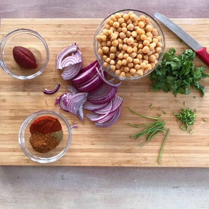 chopping board with prepared ingredients