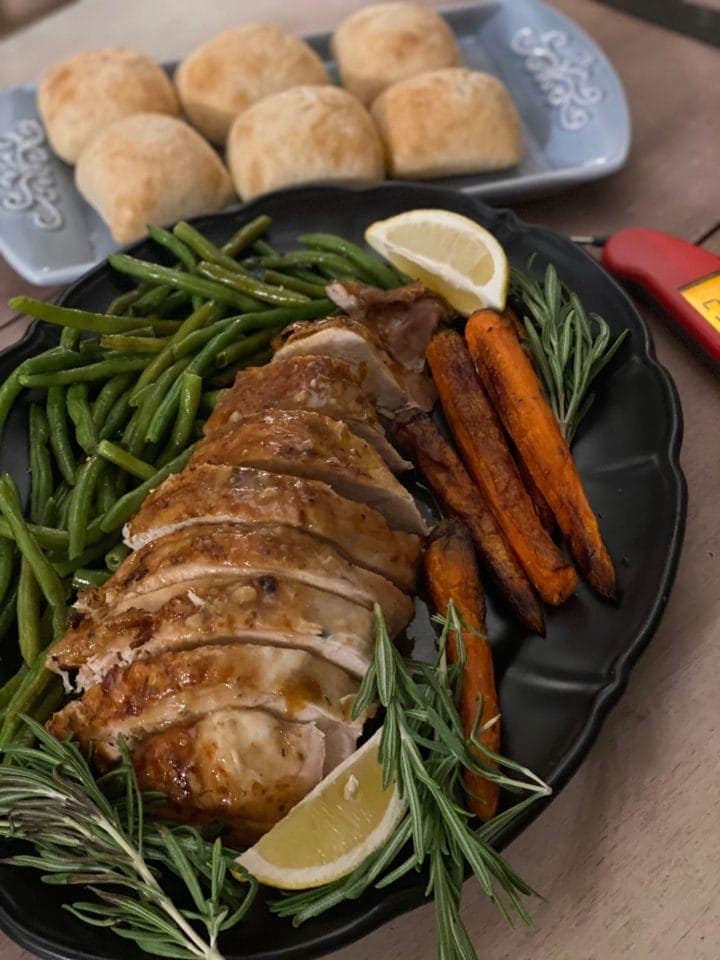 sliced turkey breast on a platter