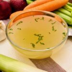 Chicken Stock in a glass bowl