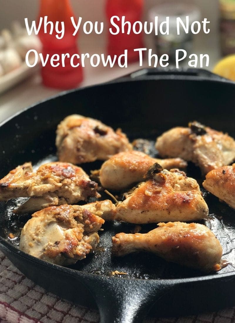 Pin image chicken in iron skillet with text overlay