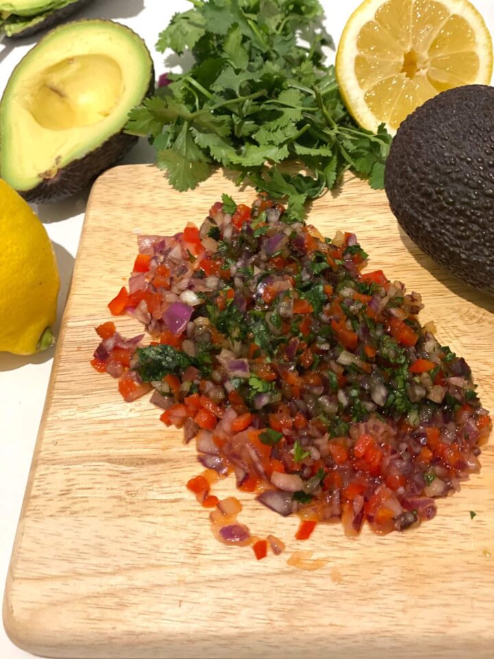 Chopping board with chopped ingredients