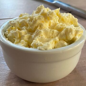 whipped butter in a small white bowl