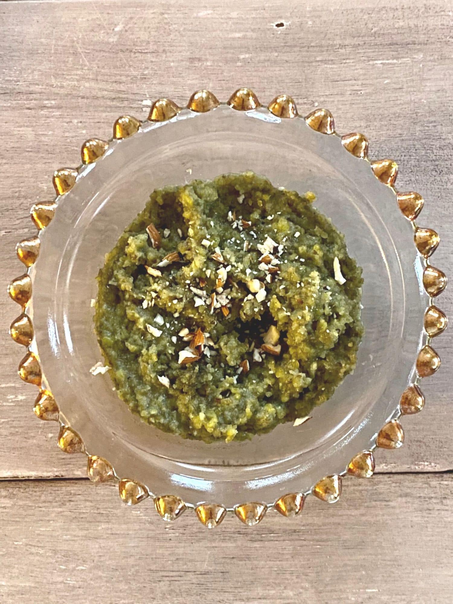 overhead view of halwa in glass bowl