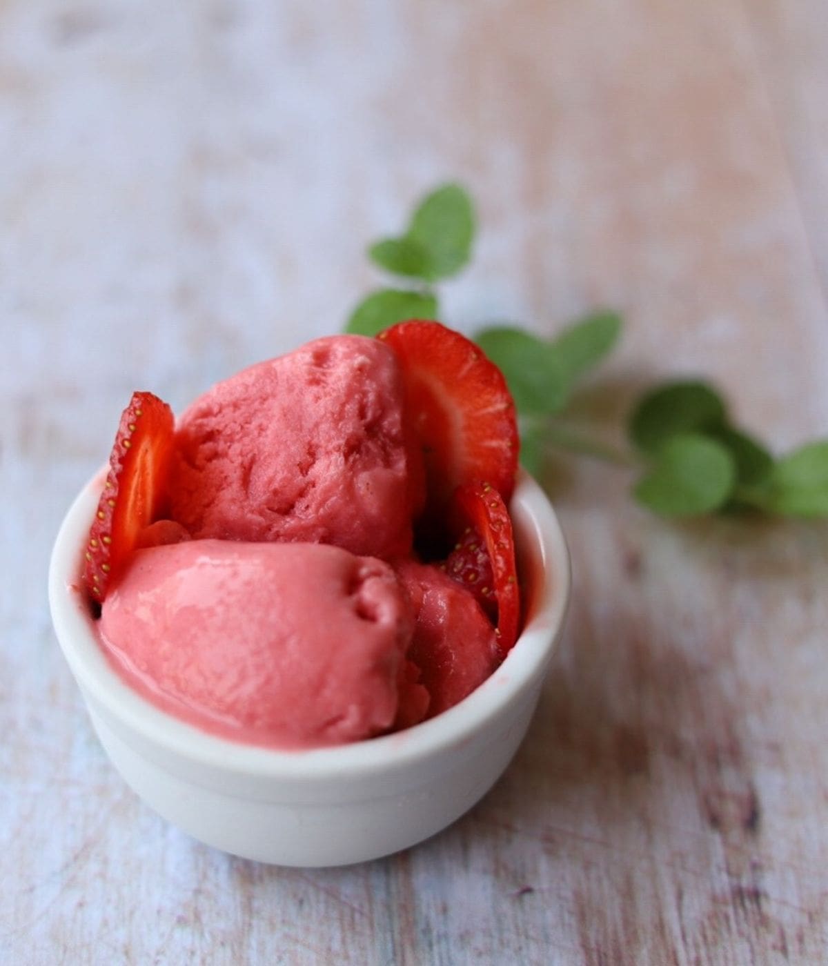 Strawberry Frozen Yogurt in small white bowl