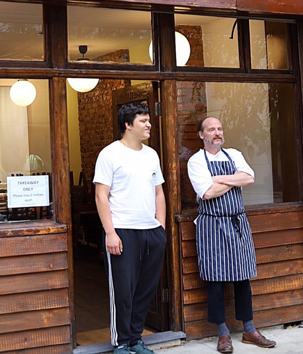 Clayton and Jake outside restaurant