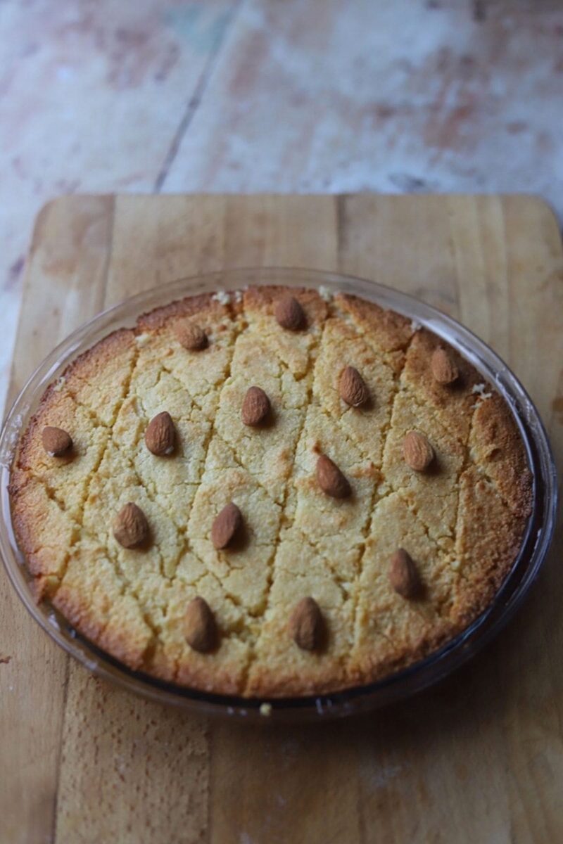 Basbousa with Almonds on wooden board
