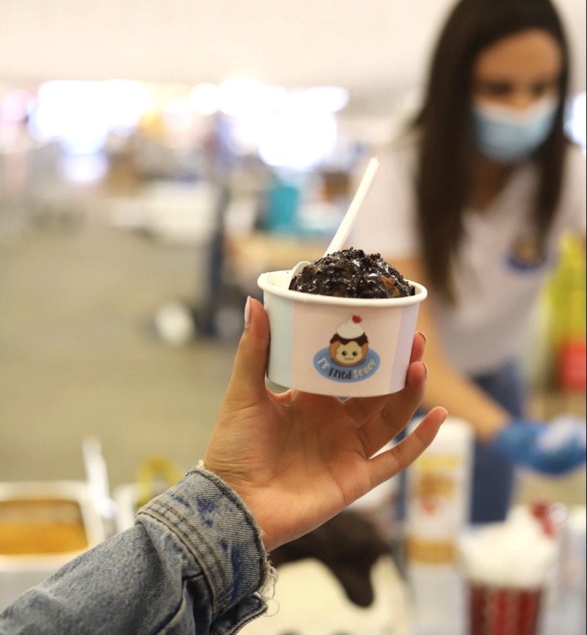 Holding a cup of fried ice cream