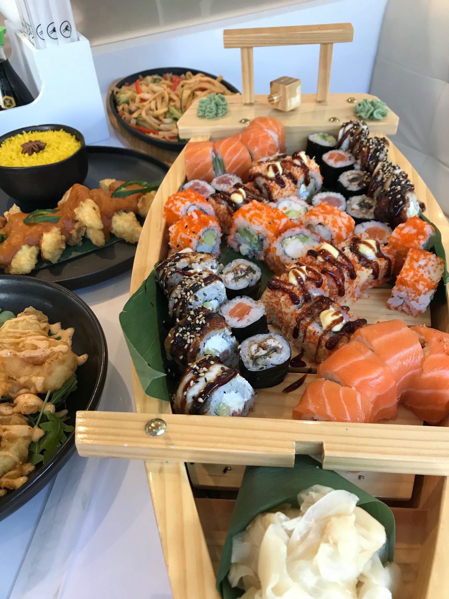 close up of assorted sushi and rolls