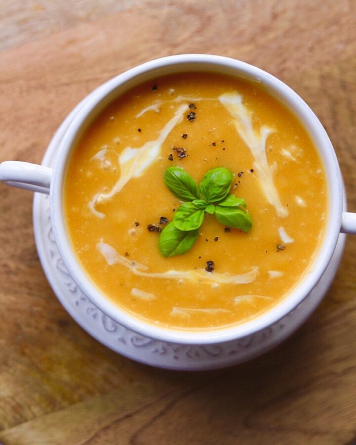 view of soup in white bowl from above