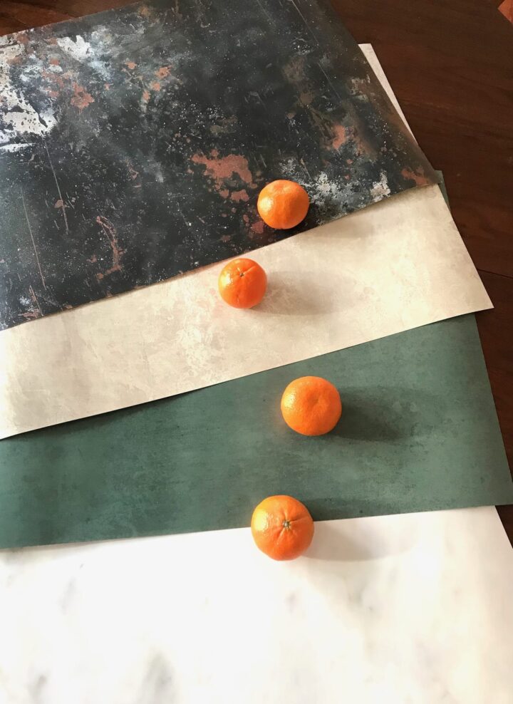 four backdrops with oranges to show the colours