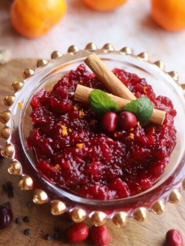 close up of cranberry sauce in glass bowl