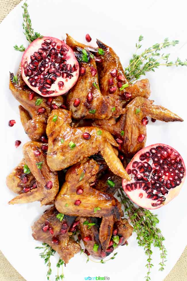 cooked chicken wings with pomegranate seeds