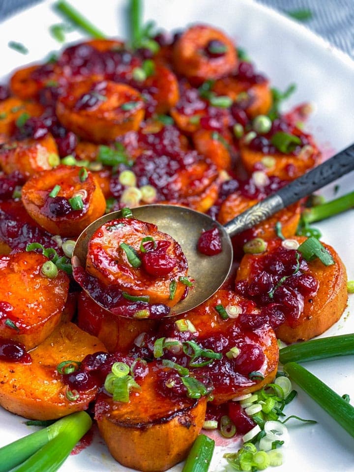close-up of roasted sweet potato with cranberries