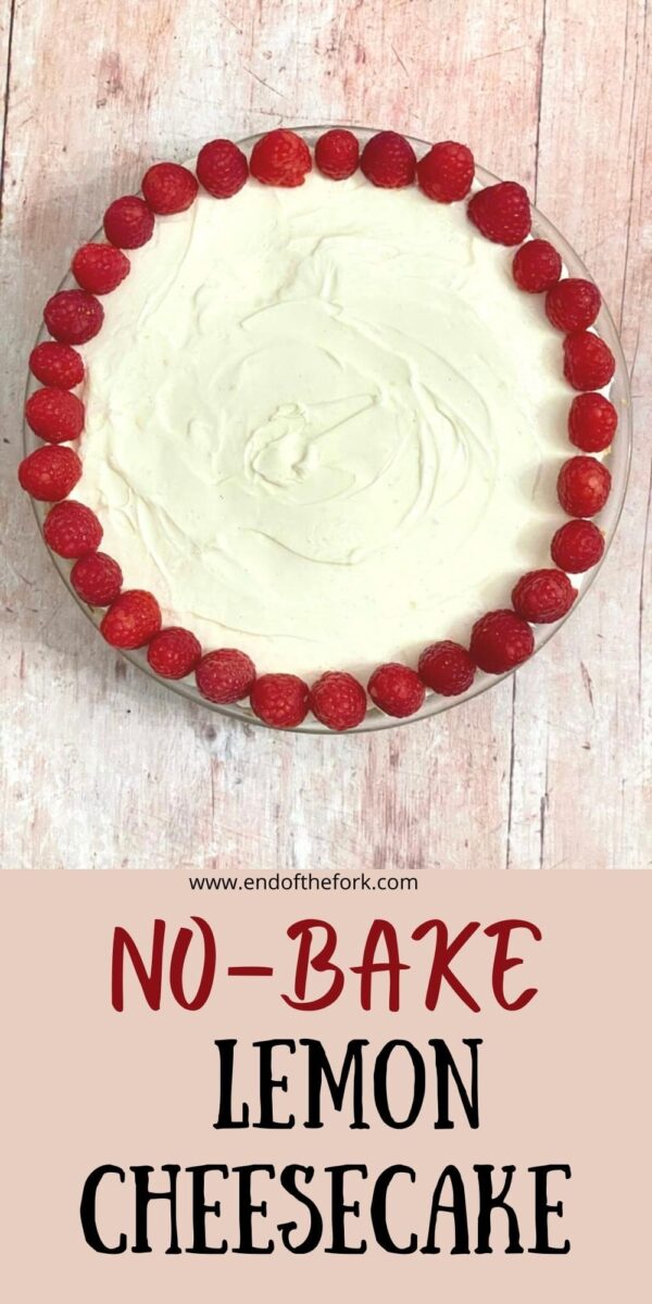Pin image of cheesecake with a border of raspberries.